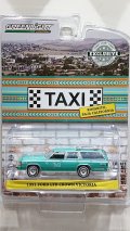 GREEN LiGHT EXCLUSIVE 1/64 1991 Ford LTD Crown Victoria Wagon Rosarito Baja Taxi Teal with White Stripes