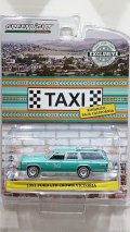 GREEN LiGHT EXCLUSIVE 1/64 1991 Ford LTD Crown Victoria Wagon Rosarito Baja Taxi Teal with White Stripes