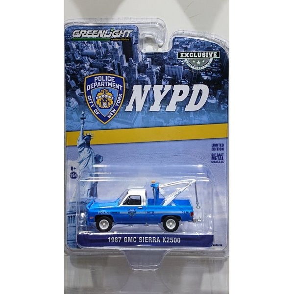 画像1: GREEN LiGHT EXCLUSIVE 1/64 1987 GMC Sierra K2500 with Drop in Tow Hook --New York City Police Dept (NYPD)