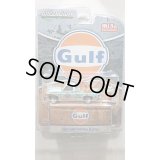 GREEN LiGHT 1/64 1987 GMC Sierra K2500 Tow Truck Blue (Weathered) Gulf with Figure