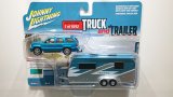 JOHNNY LIGHTNING 1/64 2005 Cadillac Escalade Blue & Camper Trailer Teal